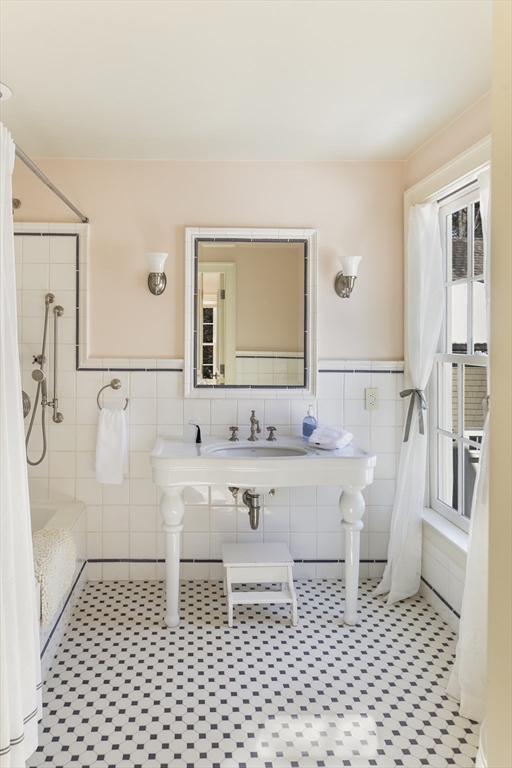 43 Oak Hill Road Harvard, MA 01451 - Photo 28 of 42 a bathroom with a sink a toilet and mirror
