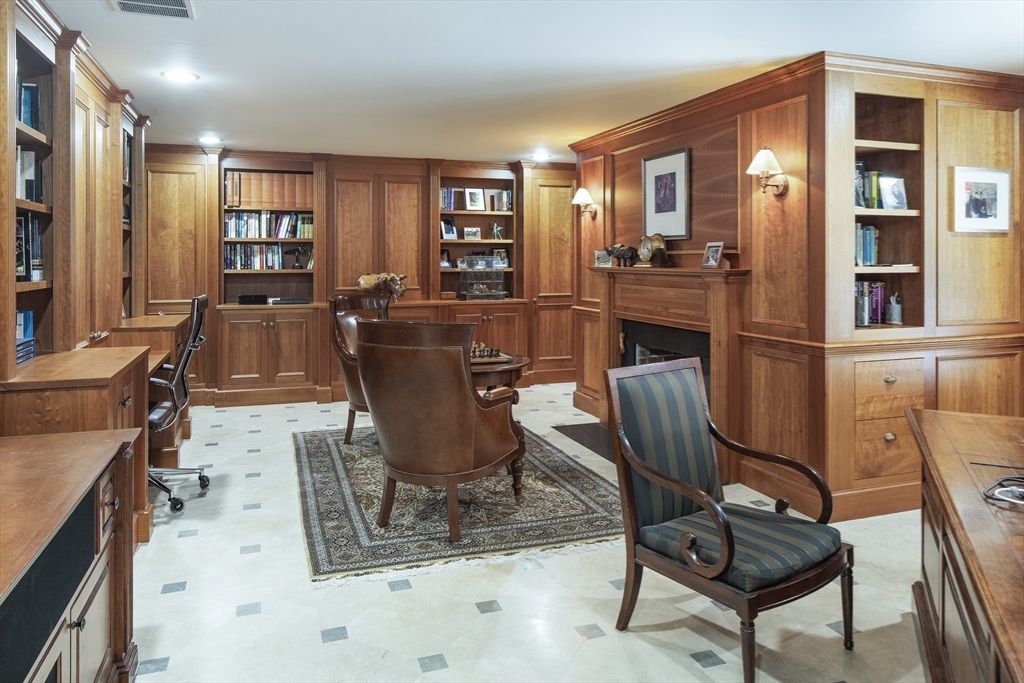 43 Oak Hill Road Harvard, MA 01451 - Photo 31 of 42 a living room with furniture a piano and a bookshelf