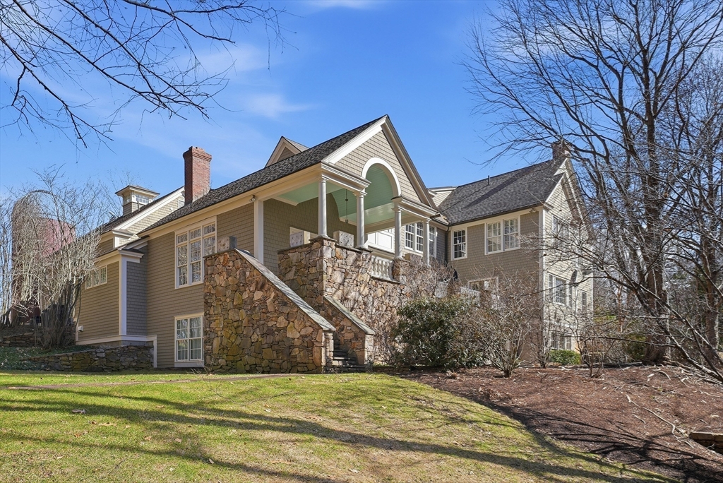 43 Oak Hill Road Harvard, MA 01451 - Photo 40 of 42 a front view of a house with a yard