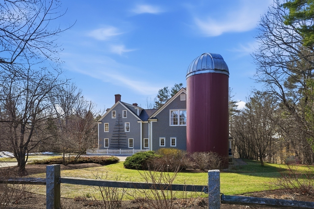 43 Oak Hill Road Harvard, MA 01451 - Photo 41 of 42 a front view of a house with garden