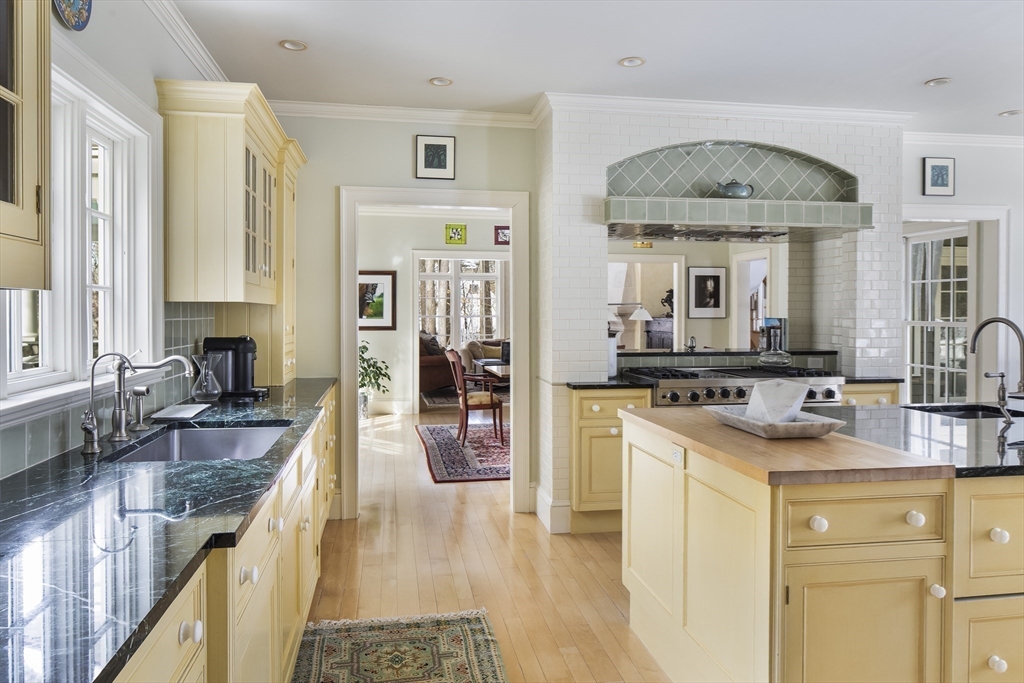 43 Oak Hill Road Harvard, MA 01451 - Photo 7 of 42 a kitchen with granite countertop a sink stove and cabinets