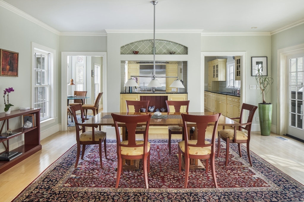 43 Oak Hill Road Harvard, MA 01451 - Photo 8 of 42 a dining room with furniture a rug and a chandelier