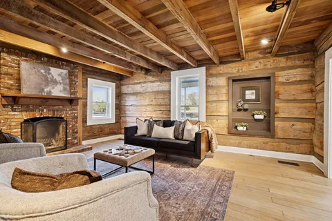 a fireplace with a clock on top of it