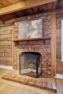 a view of a livingroom with furniture and window