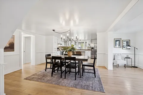 a kitchen with granite countertop cabinets stainless steel appliances and sink