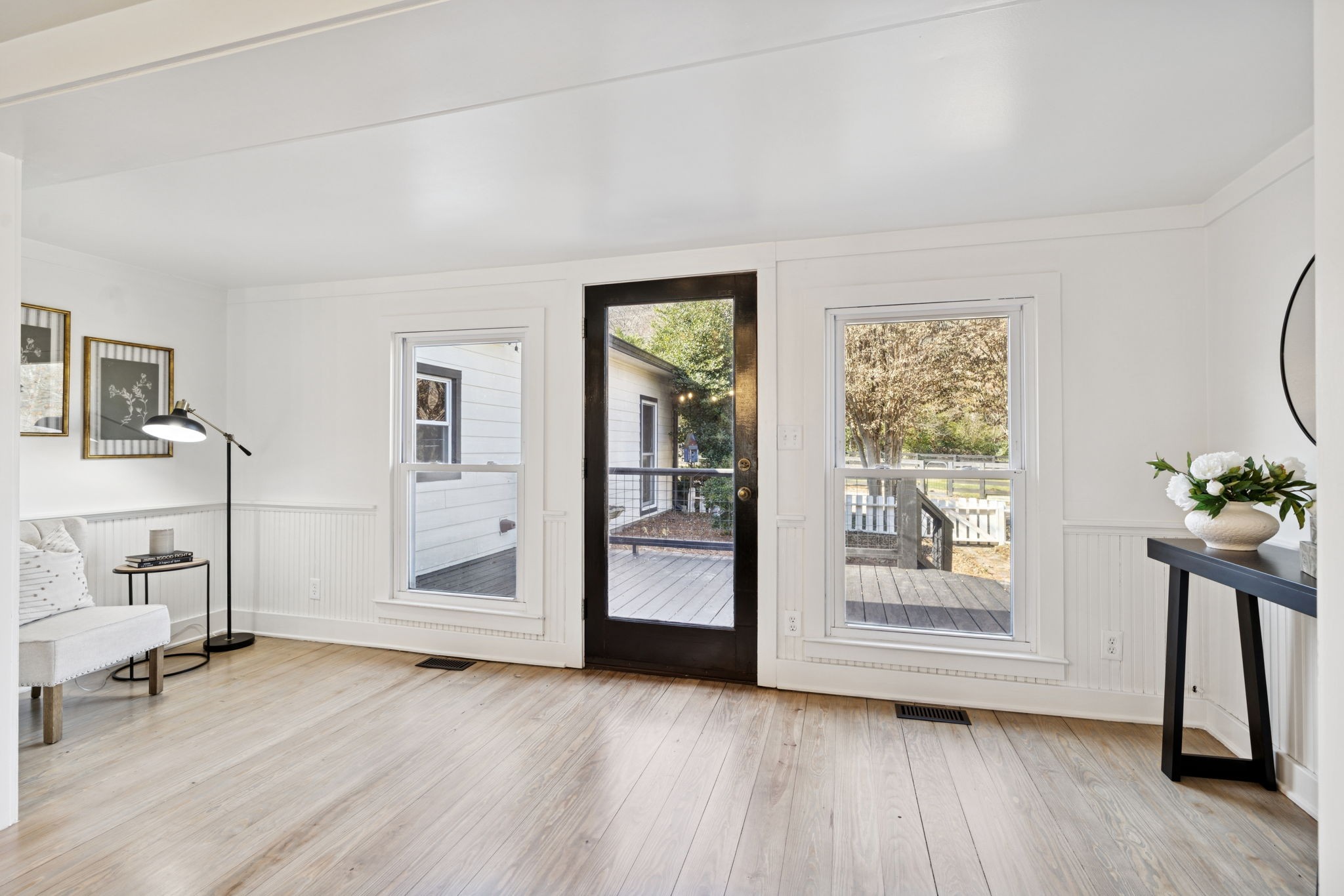5467 Pinewood Road Franklin, TN 37064 - Photo 25 of 98 a view of an empty room with a window and wooden floor