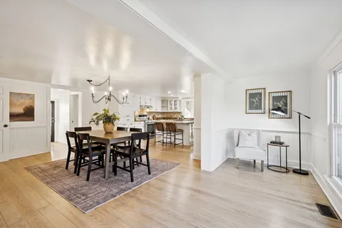 a bathroom with a granite countertop sink and shower