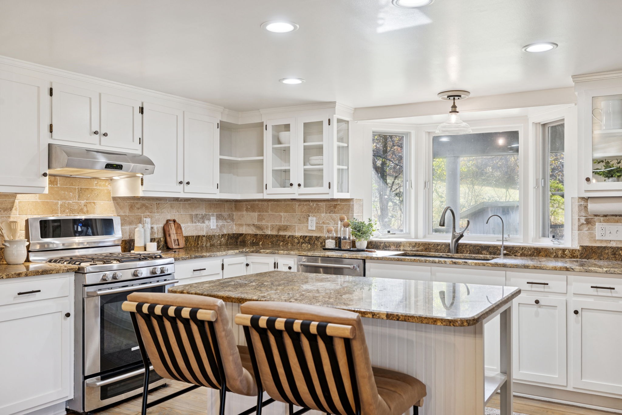 5467 Pinewood Road Franklin, TN 37064 - Photo 29 of 98 a kitchen with granite countertop a sink a counter space appliances and cabinets