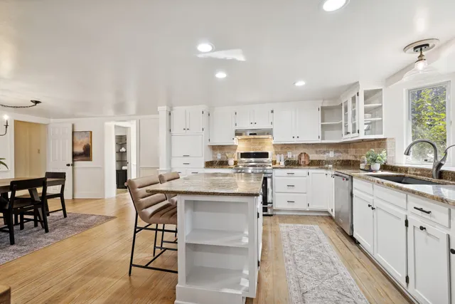 a view of workspace with furniture and window