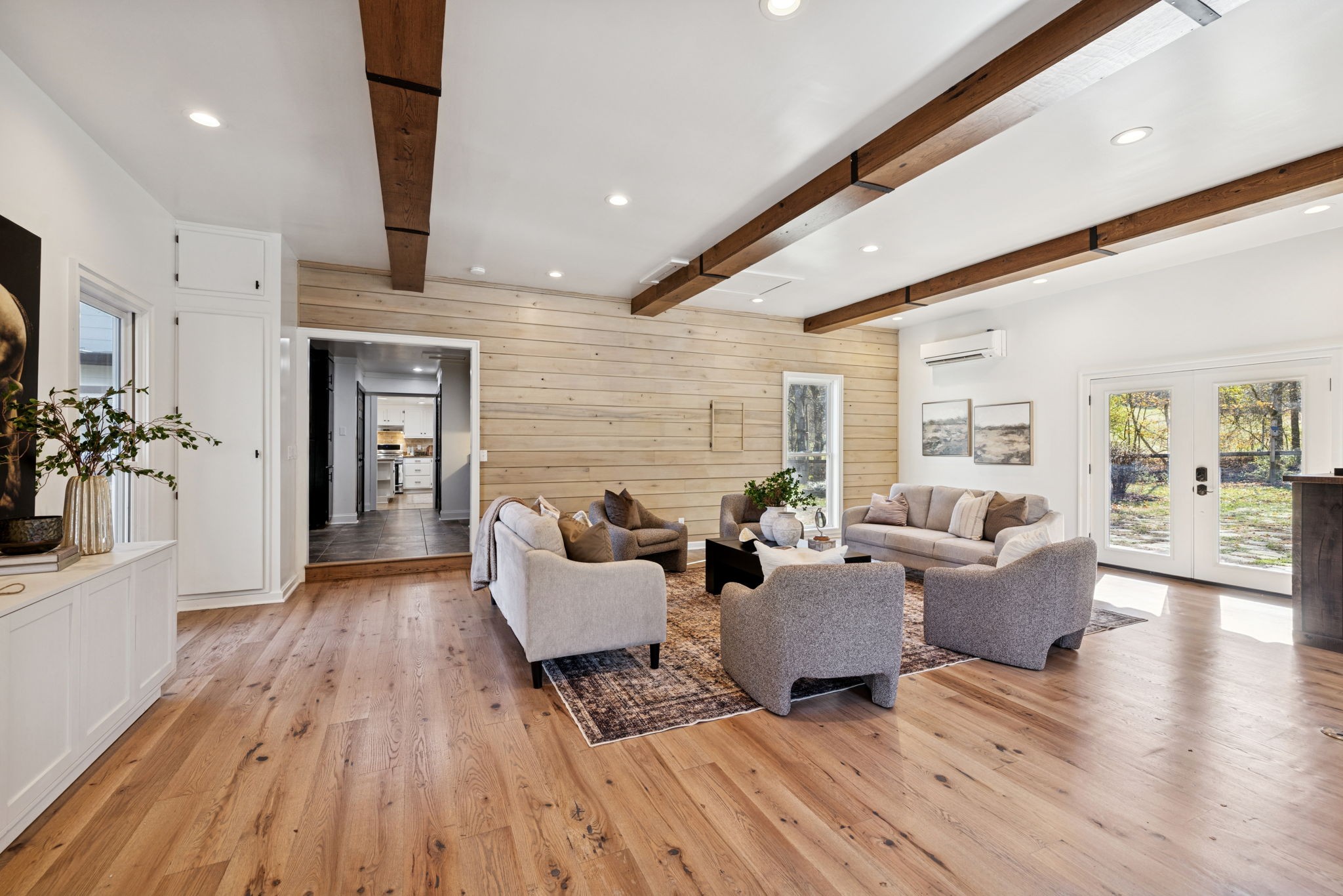 5467 Pinewood Road Franklin, TN 37064 - Photo 43 of 98 a living room with furniture or wooden floor and a fireplace