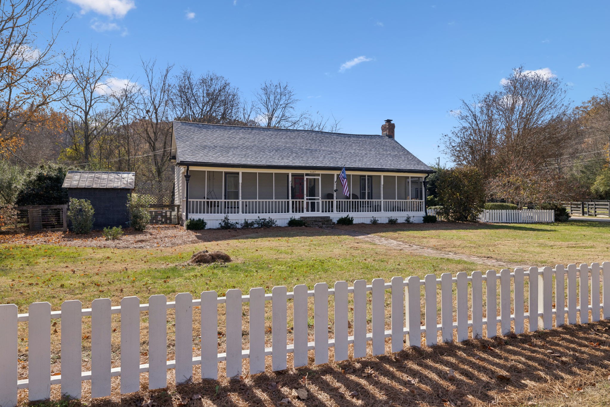 5467 Pinewood Road Franklin, TN 37064 - Photo 5 of 98 a view of a house with swimming pool and a yard