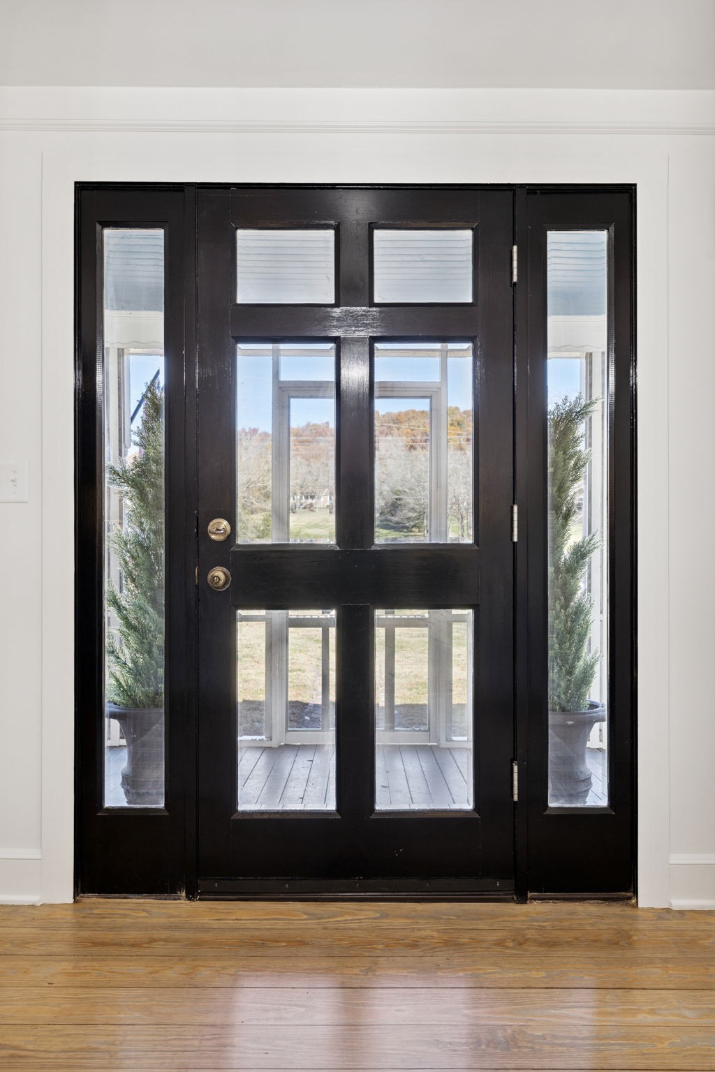 5467 Pinewood Road Franklin, TN 37064 - Photo 9 of 98 a view of empty room with wooden floor and windows