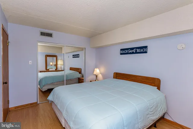 a view of balcony with wooden floor