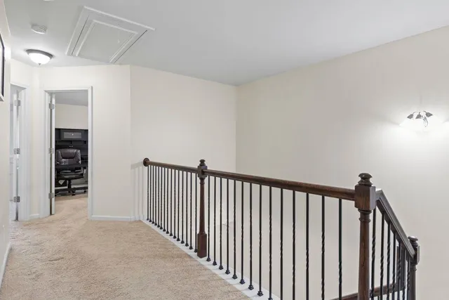 a view of a hallway with closet area
