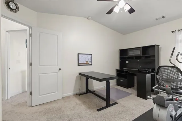 a view of workspace with workspace and mirror