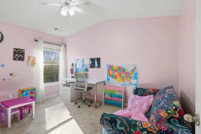 a living room with furniture and a couch
