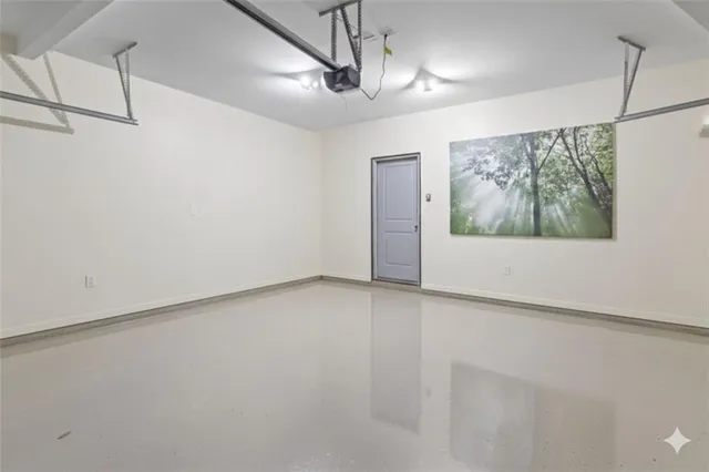 a view of a room with window and a ceiling fan