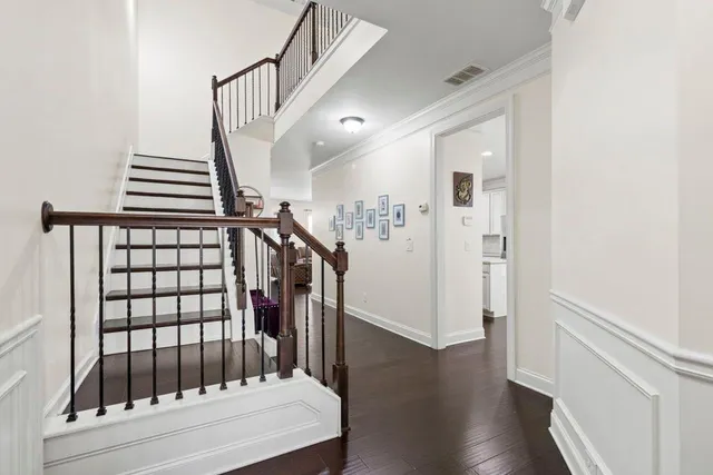 a view of entryway with wooden floor