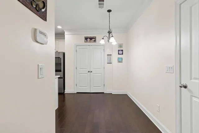 a view of a livingroom with wooden floor