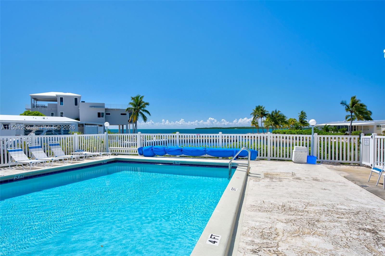 84 Coral Way Key Largo, FL 33037 - Photo 50 of 55 a view of swimming pool with outdoor seating