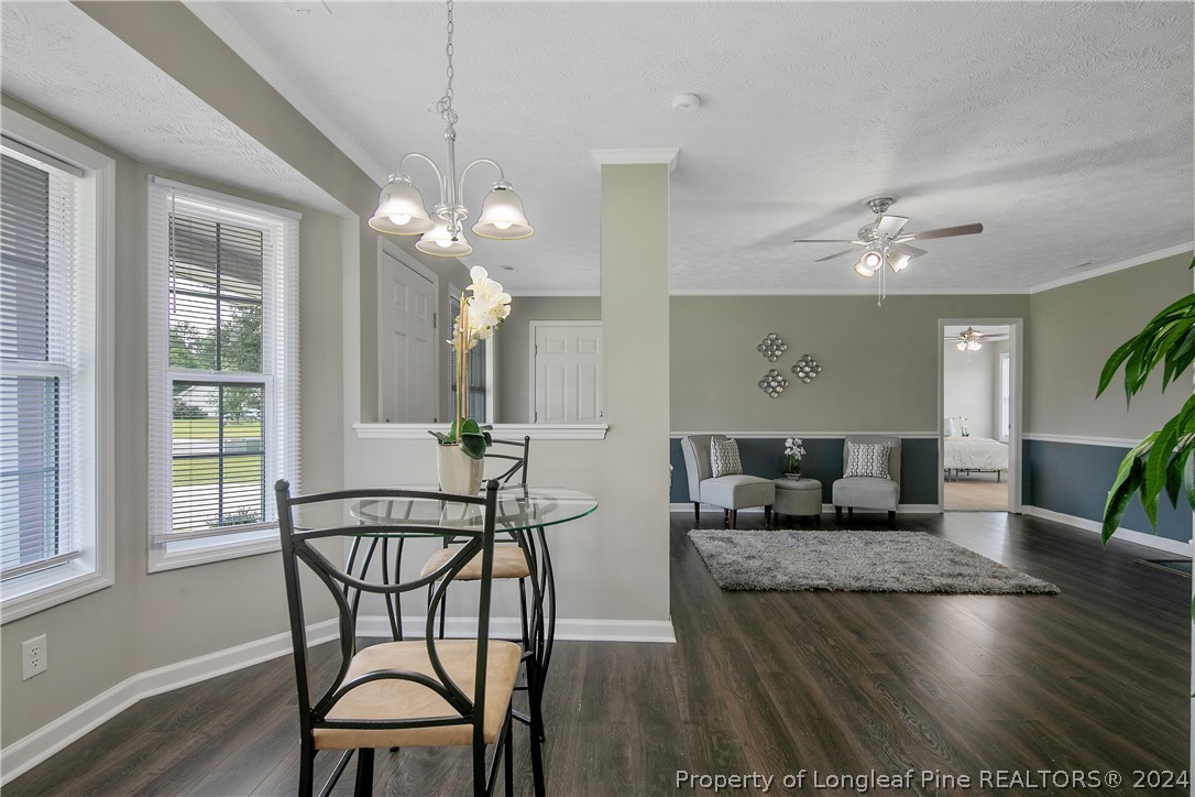 130 Rye Lane Raeford, NC 28376 - Photo 11 of 38 a view of a livingroom with furniture window and wooden floor