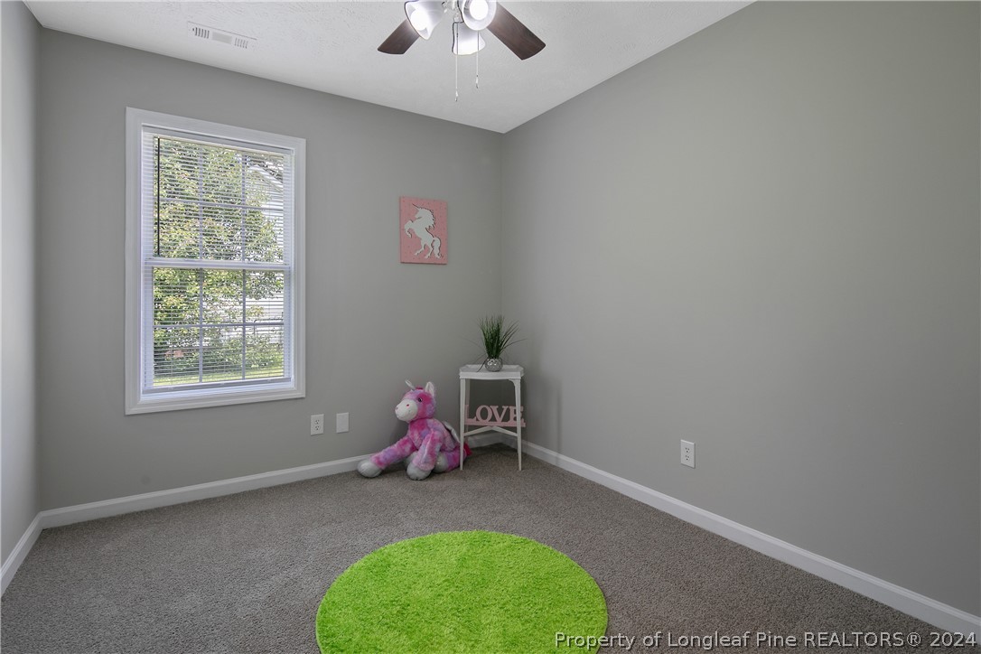 130 Rye Lane Raeford, NC 28376 - Photo 25 of 38 a living room with furniture and a window