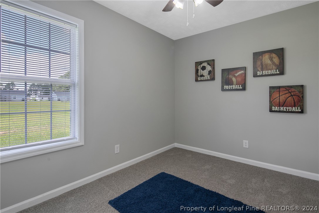 130 Rye Lane Raeford, NC 28376 - Photo 31 of 38 a room that has a window in it
