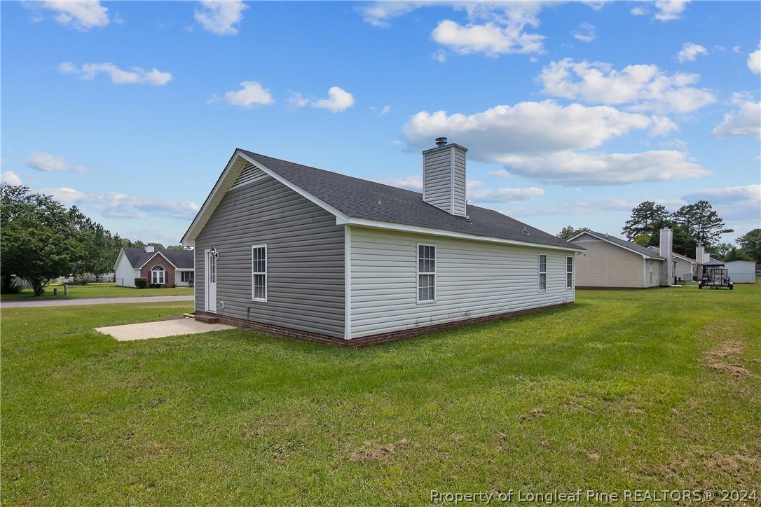130 Rye Lane Raeford, NC 28376 - Photo 37 of 38 a view of a house with a yard