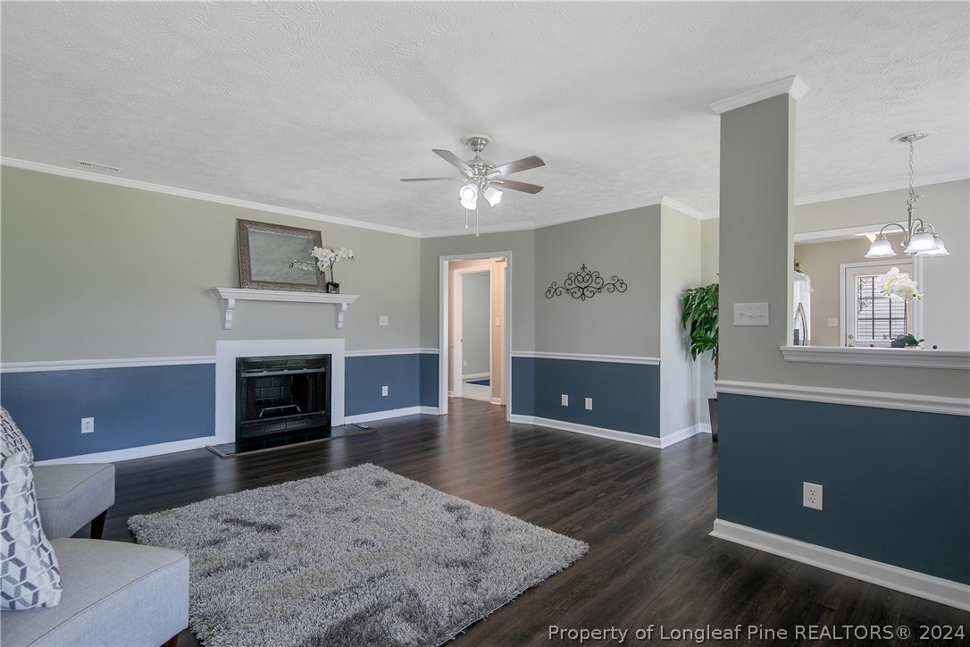 130 Rye Lane Raeford, NC 28376 - Photo 6 of 38 a living room with furniture and a fireplace