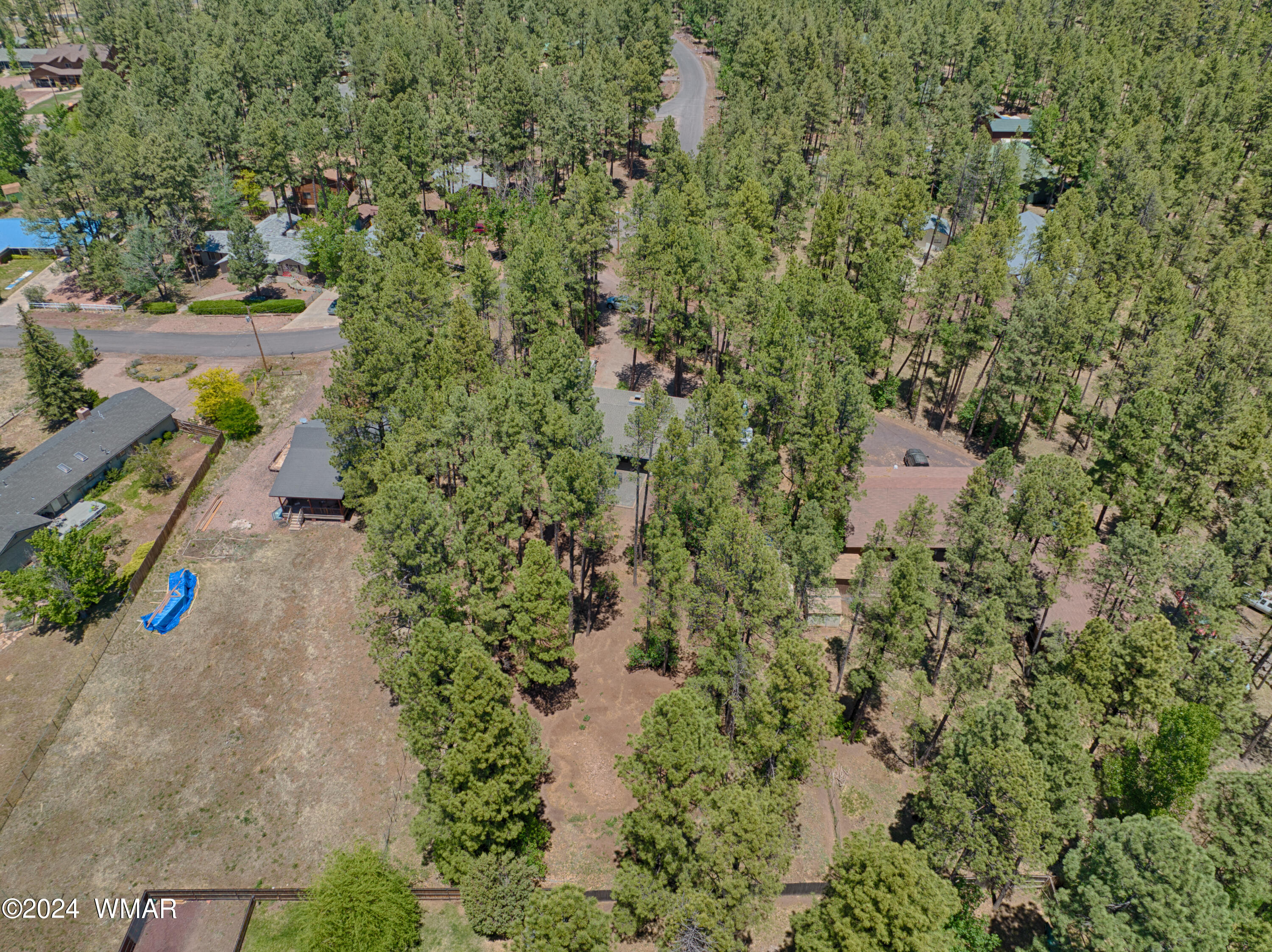 625 East Nora Place Pinetop, AZ 85935 - Photo 32 of 35 an aerial view of a house with a yard and garden