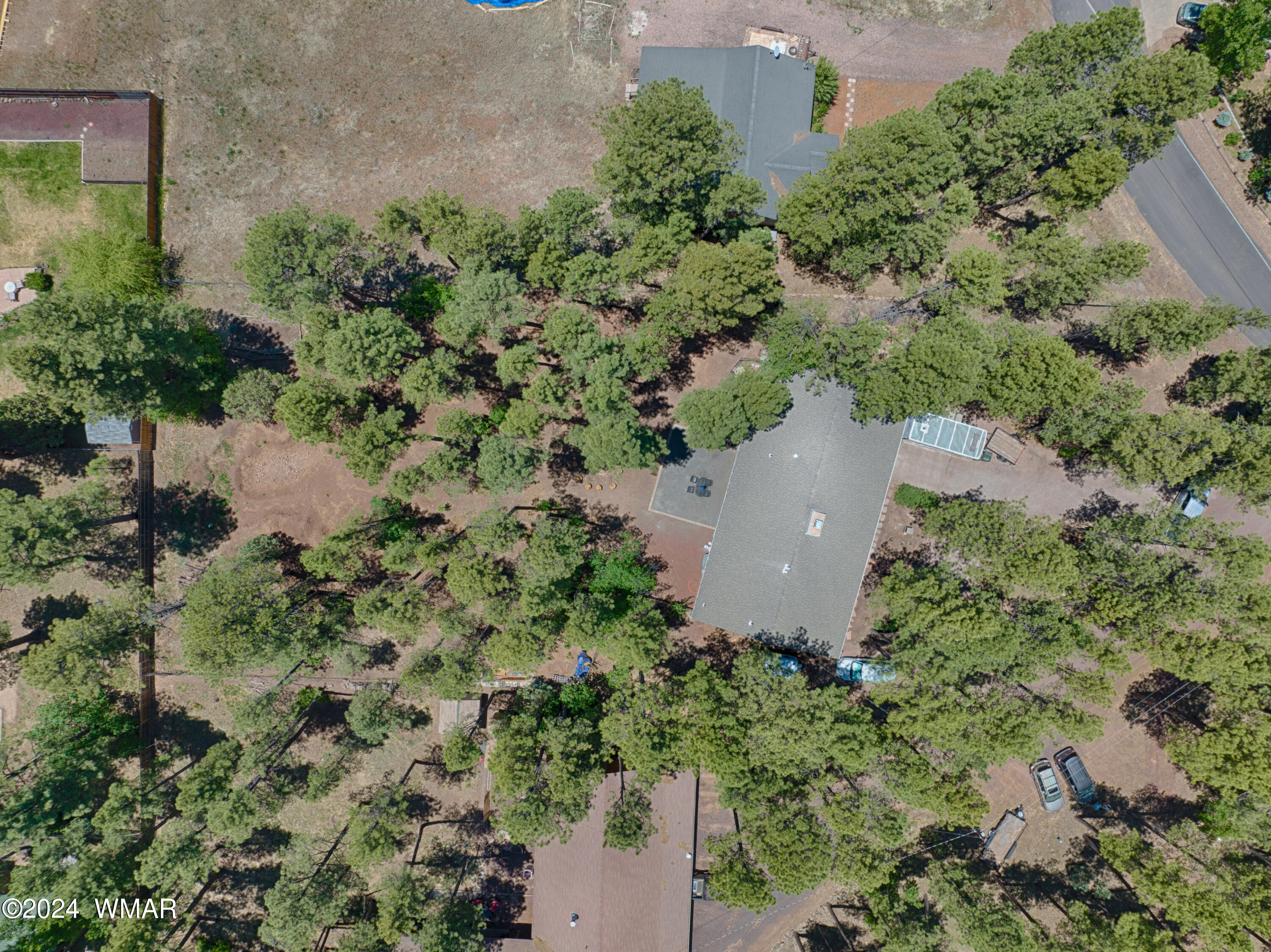 625 East Nora Place Pinetop, AZ 85935 - Photo 33 of 35 an aerial view of a house with a yard and outdoor seating