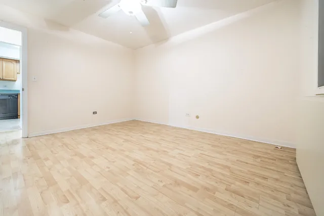 a bathroom with a toilet and a bathtub