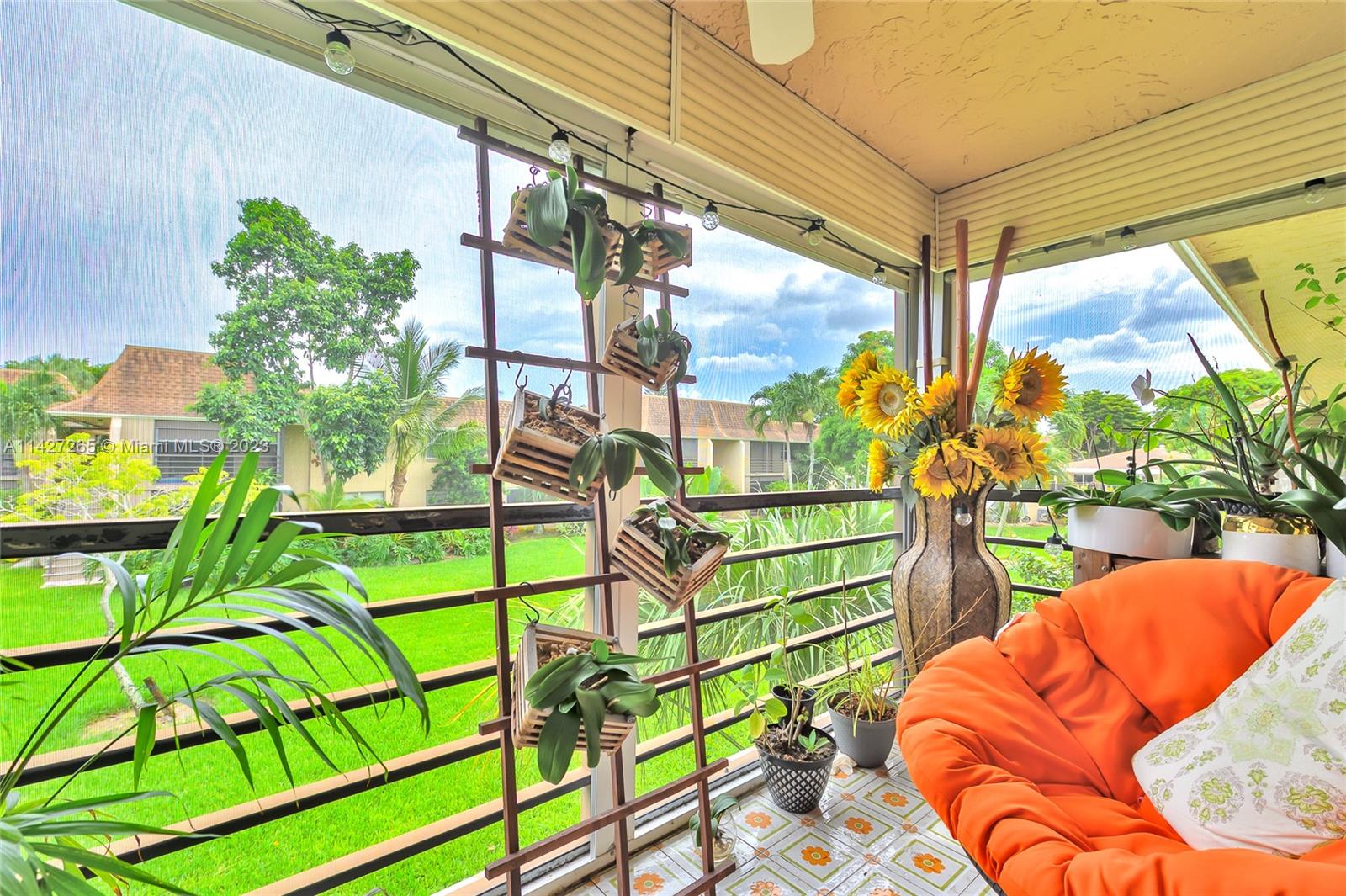 1231 Northwest 13th Street, Unit 472F Boca Raton, FL 33486 - Photo 17 of 22 a view of outdoor seating