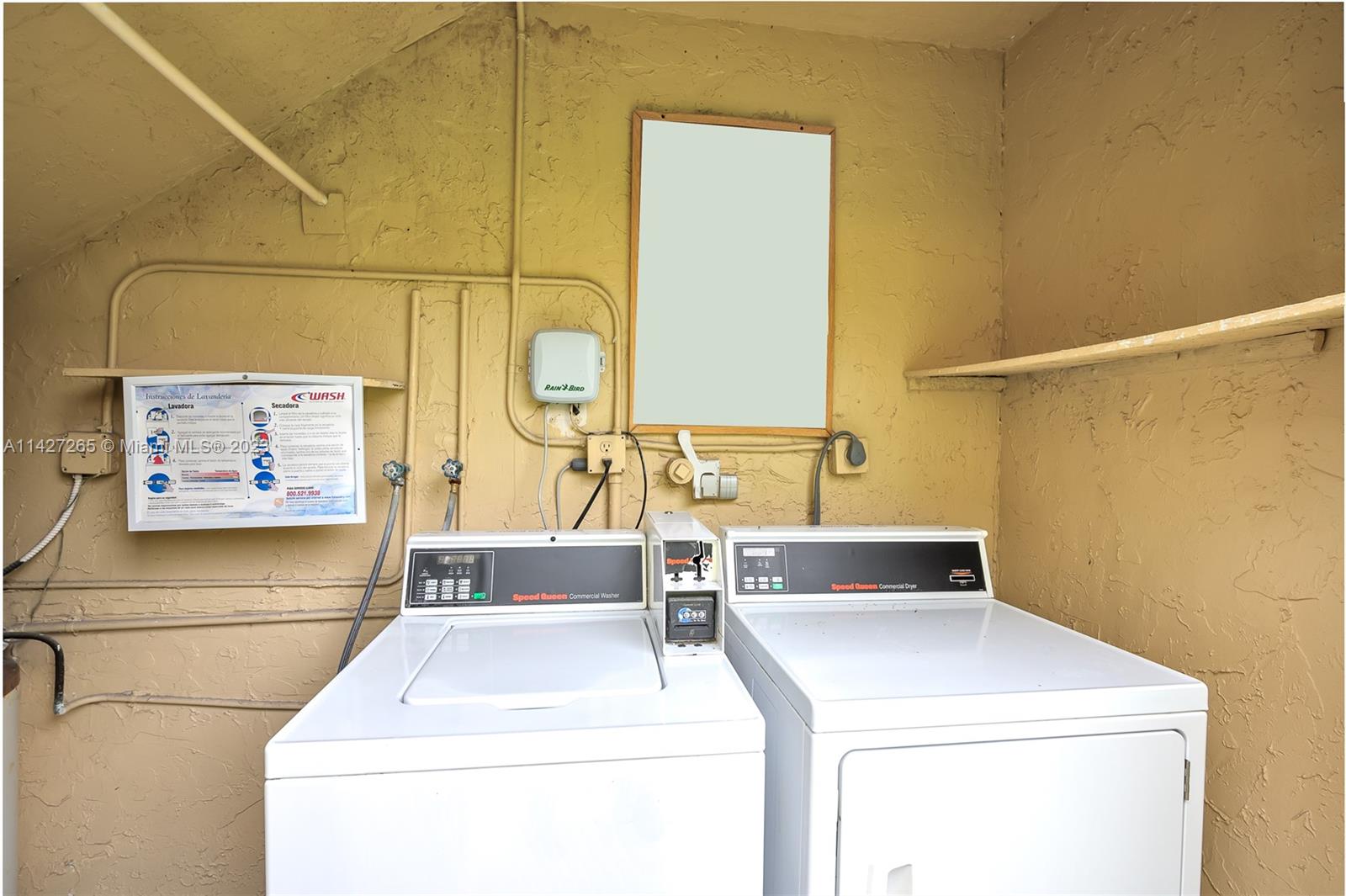 1231 Northwest 13th Street, Unit 472F Boca Raton, FL 33486 - Photo 21 of 22 a utility room with dryer and washer