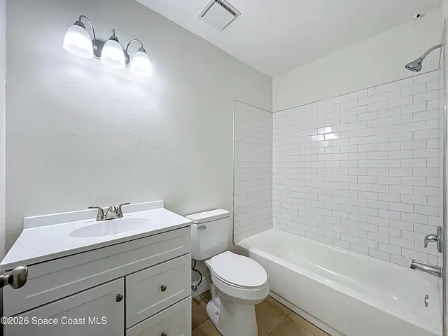 a bathroom with a sink toilet and a bathtub