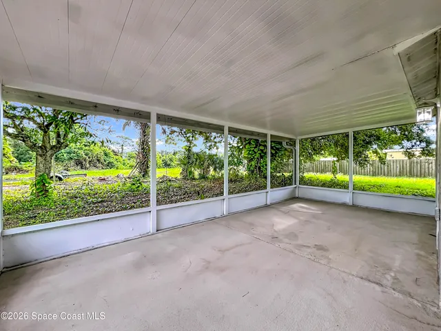 a view of a garden with potted plants