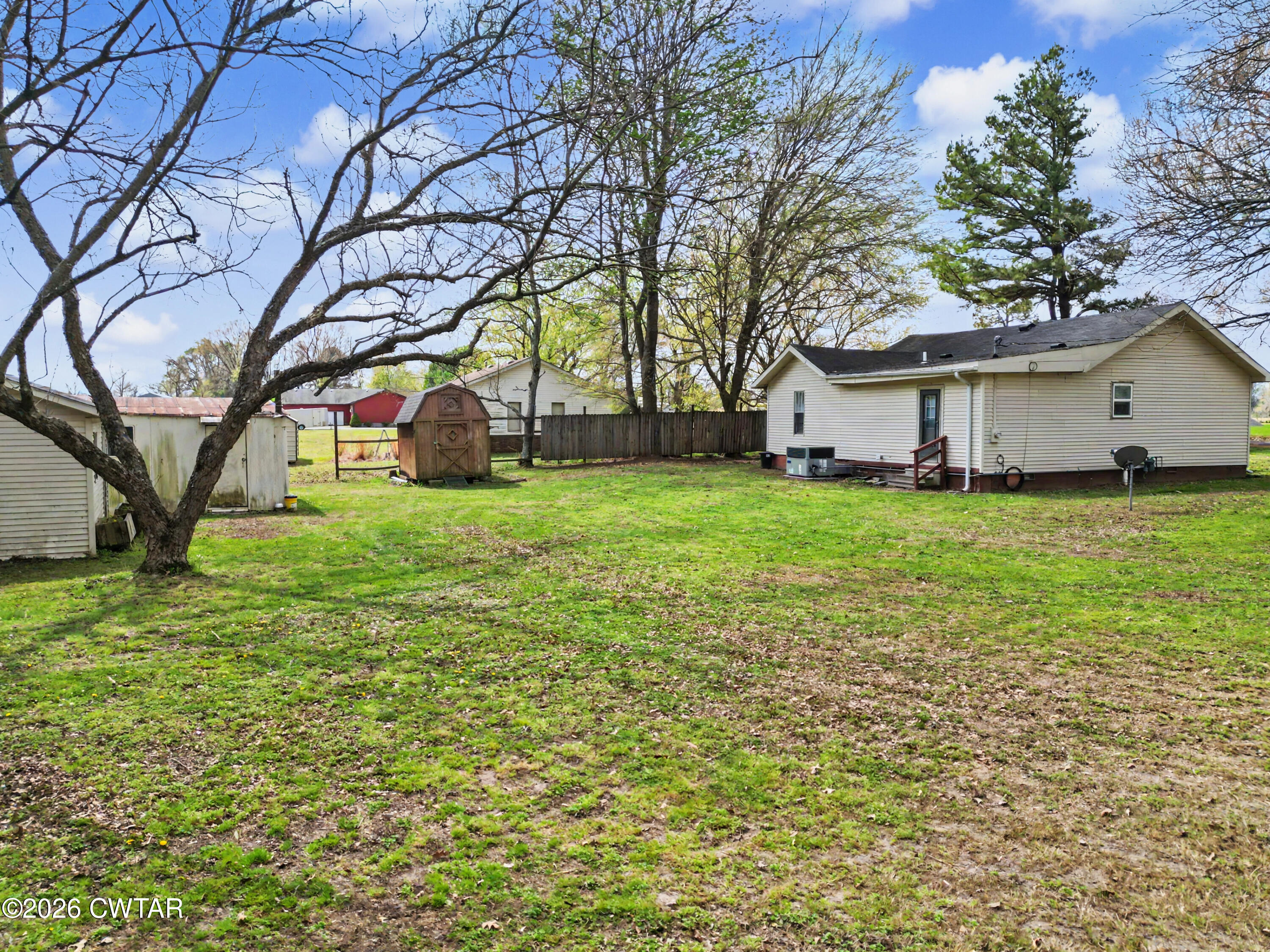 158 Depot Street Friendship, TN 38034 - Photo 5 of 16 a view of a house with a yard