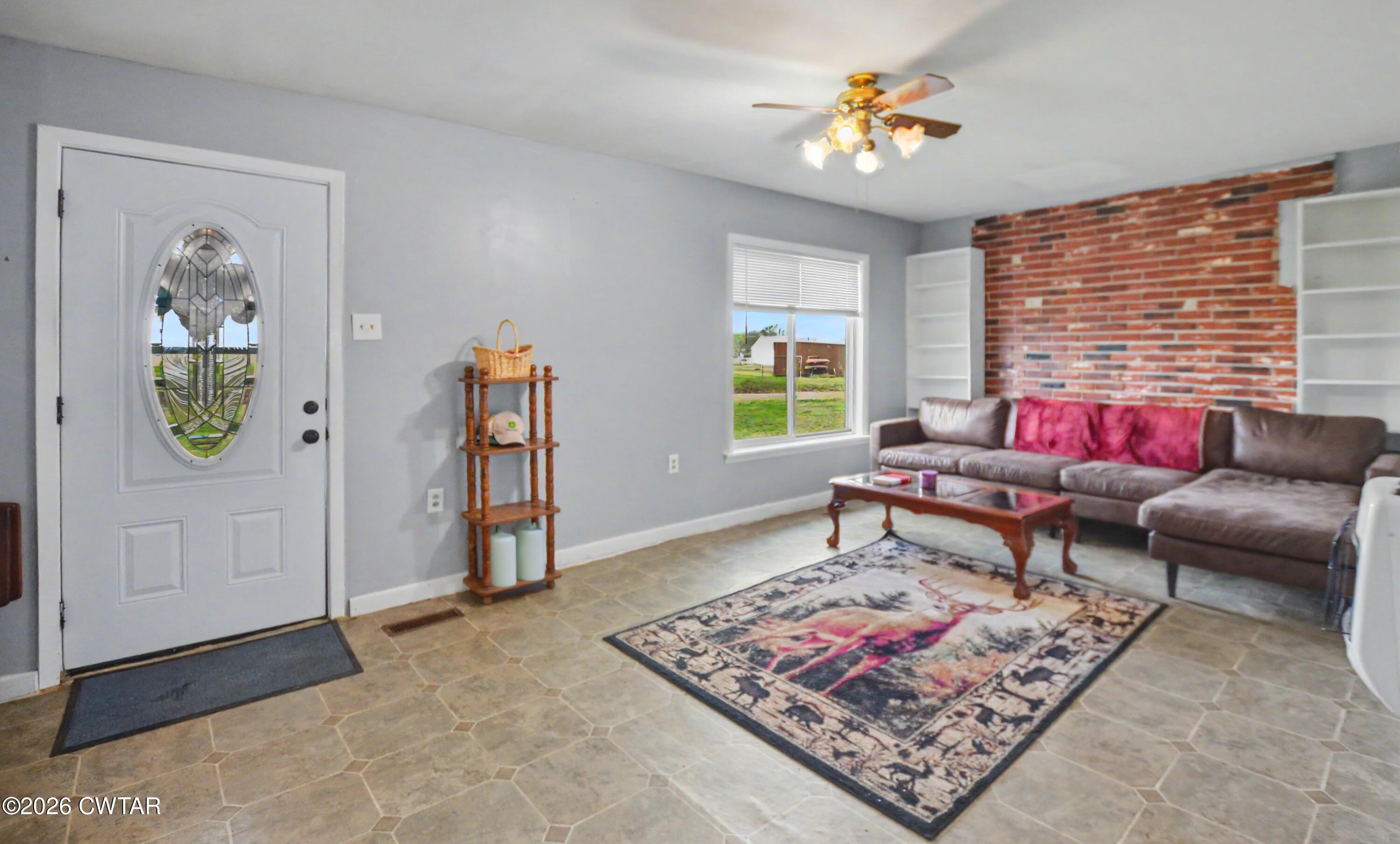 158 Depot Street Friendship, TN 38034 - Photo 7 of 16 a living room with furniture and a rug