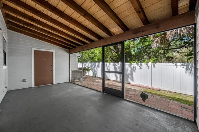 a view of an empty room with a balcony