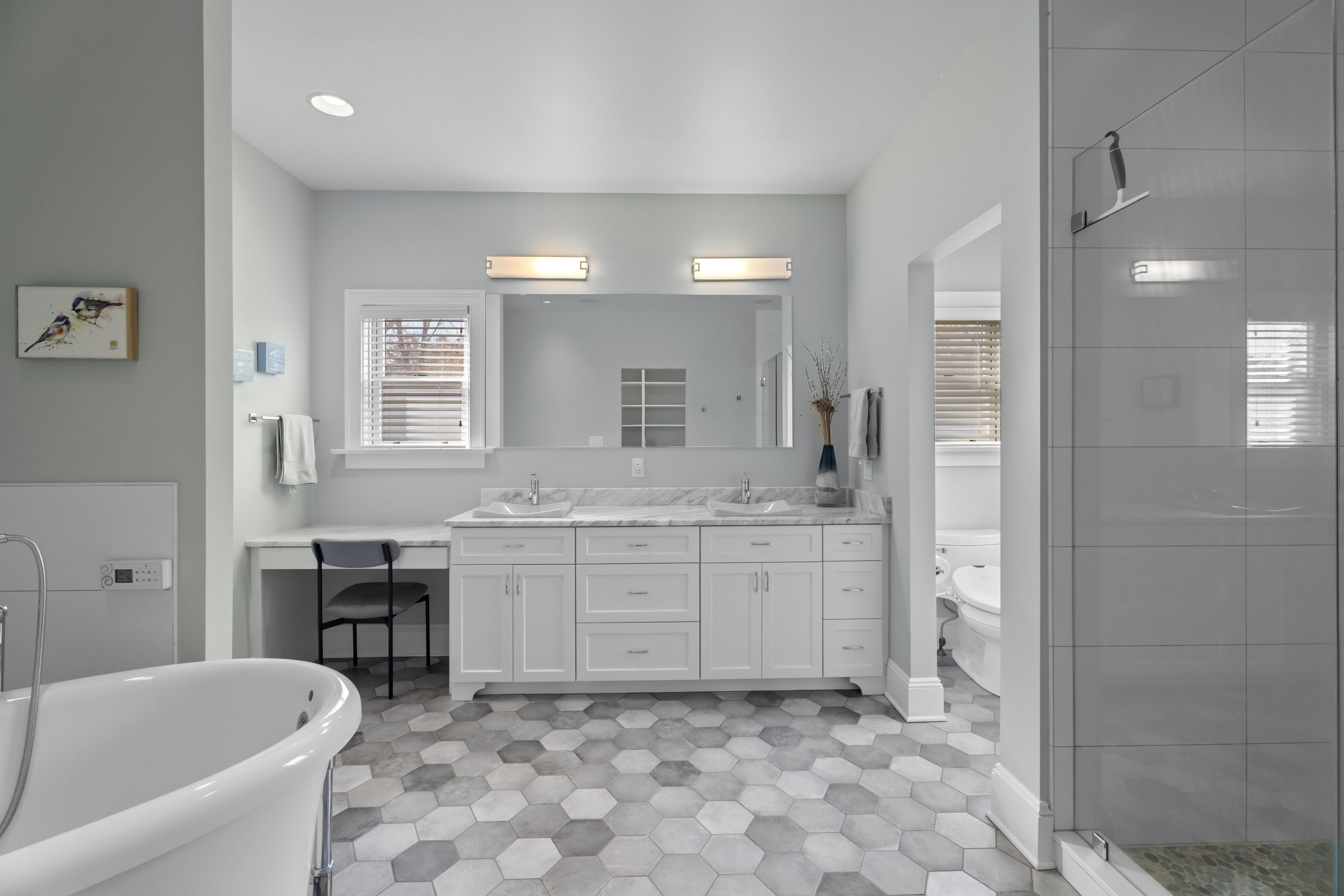 4 East Neck Road Stonington, CT 06378 - Photo 17 of 40 a bathroom with a granite countertop sink a toilet a mirror and bathtub