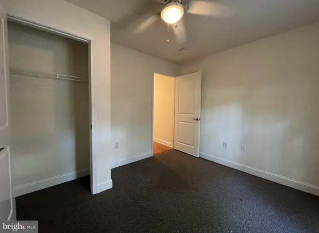 an empty room with a empty space and window