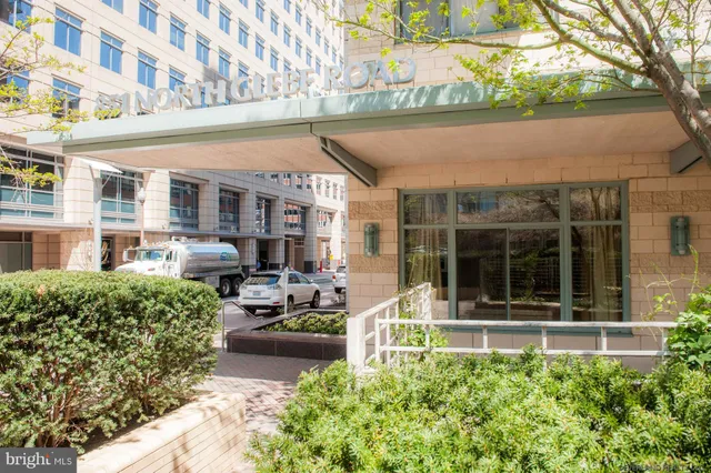 a front view of a building with garden