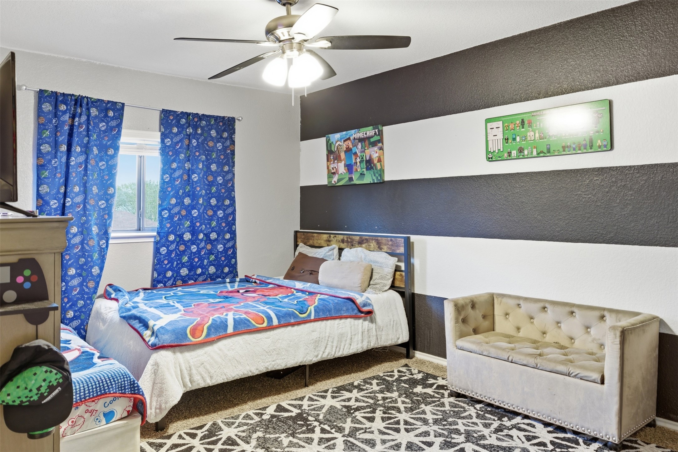 5701 Malarkey Road Del Valle, TX 78617 - Photo 15 of 27 Bedroom featuring carpet flooring and a ceiling fan