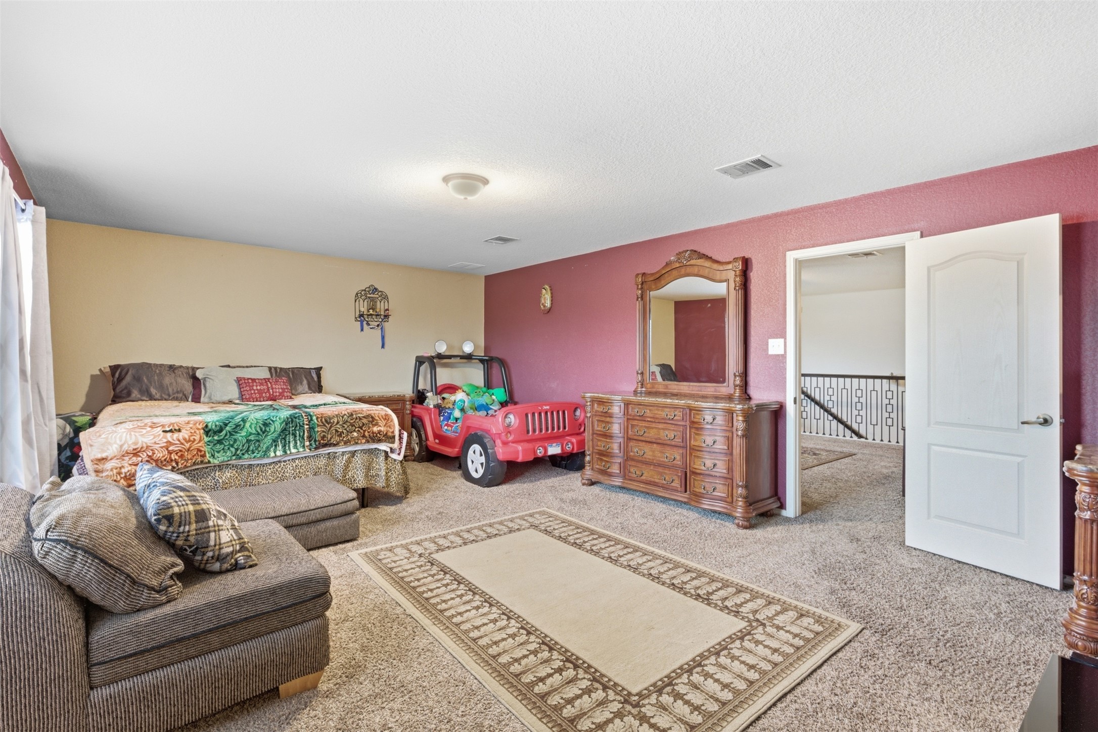 5701 Malarkey Road Del Valle, TX 78617 - Photo 18 of 27 View of carpeted bedroom