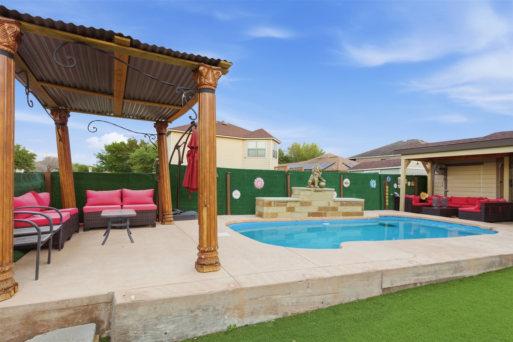 5701 Malarkey Road Del Valle, TX 78617 - Photo 25 of 27 View of pool featuring outdoor seating, patio surround, and a fenced backyard