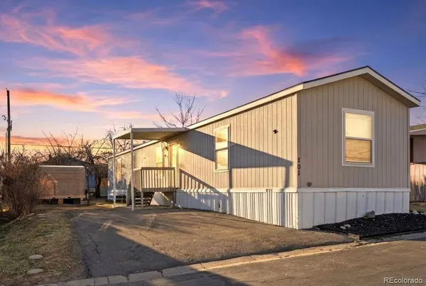 a view of a house with a street