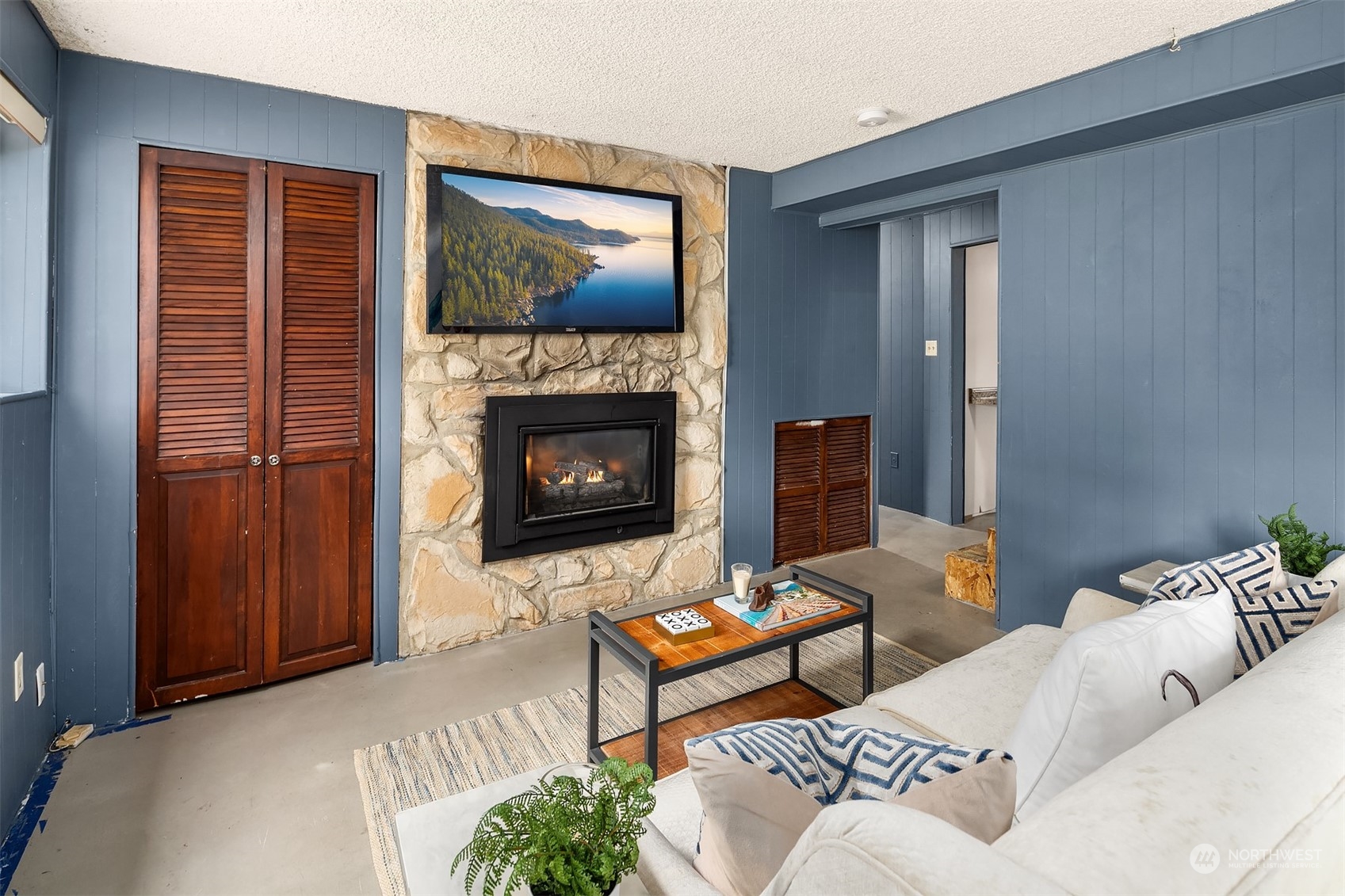201 Thomas Avenue Southwest Renton, WA 98057 - Photo 20 of 38 a living room with furniture and a fireplace