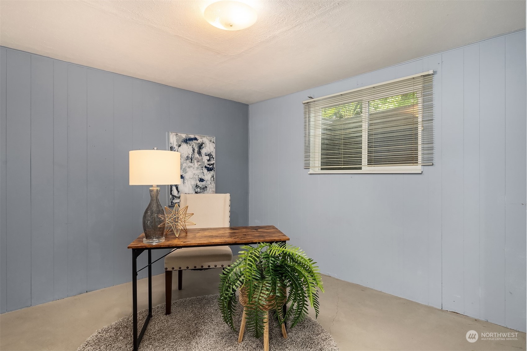 201 Thomas Avenue Southwest Renton, WA 98057 - Photo 24 of 38 a living room with furniture and a window