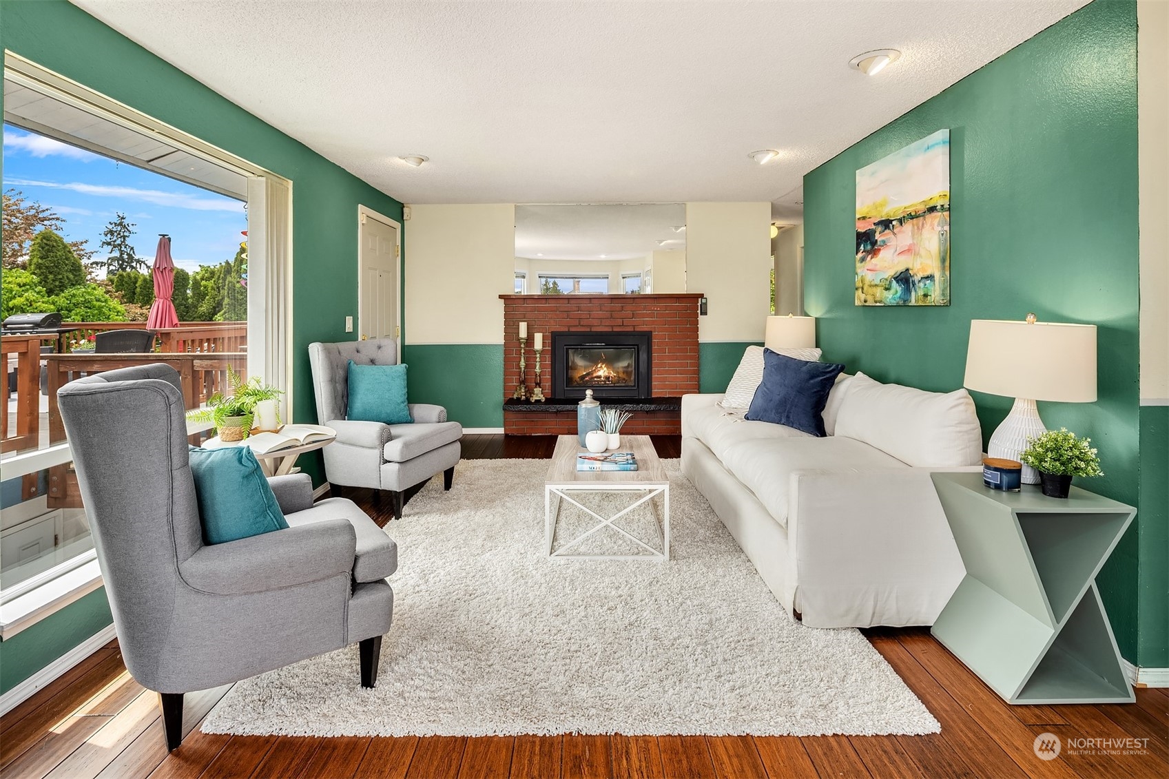 201 Thomas Avenue Southwest Renton, WA 98057 - Photo 3 of 38 a living room with furniture and a fireplace