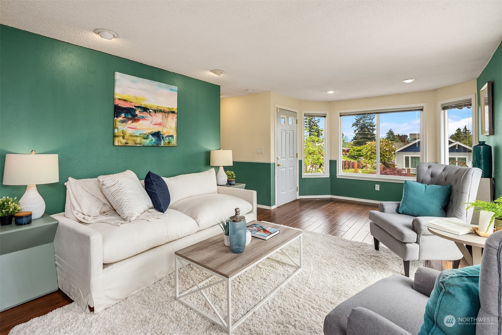 201 Thomas Avenue Southwest Renton, WA 98057 - Photo 5 of 38 a living room with furniture and a flat screen tv